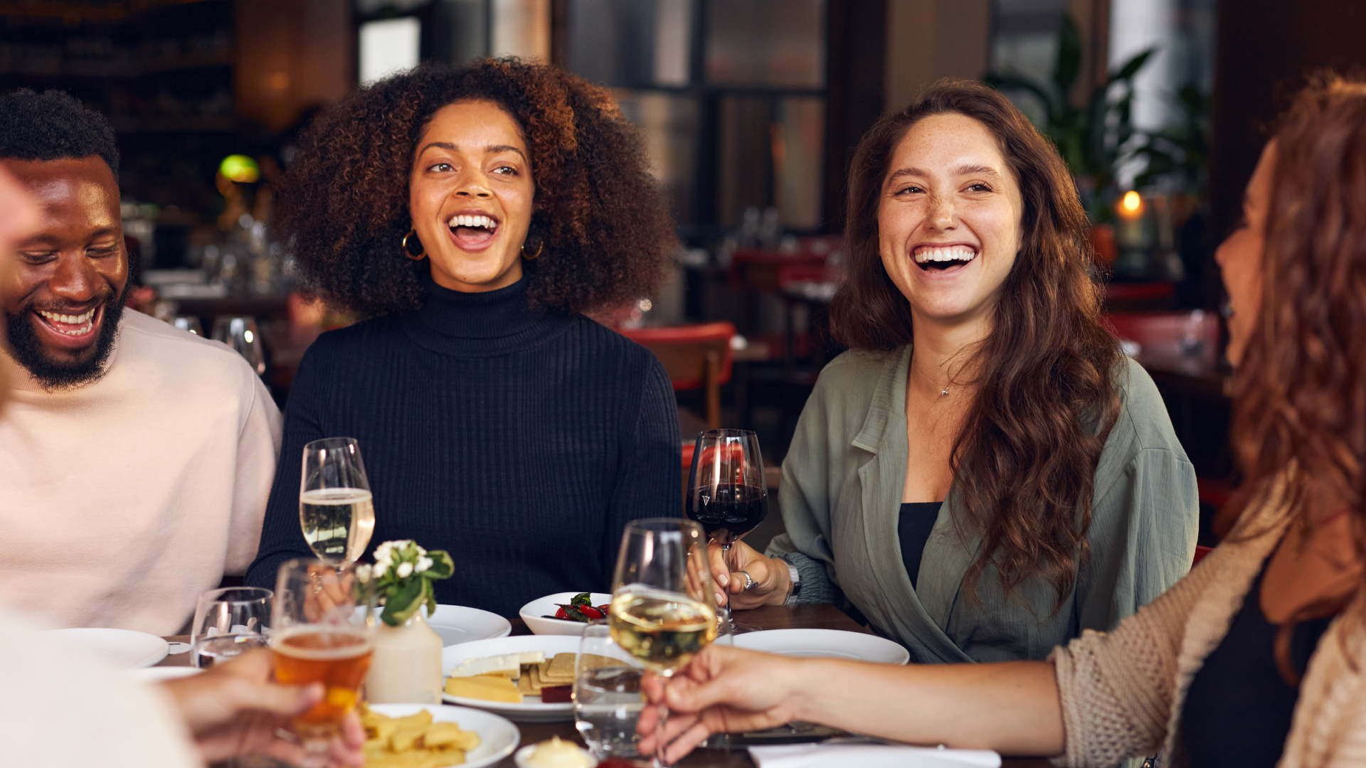 People Laughing At Restaurant